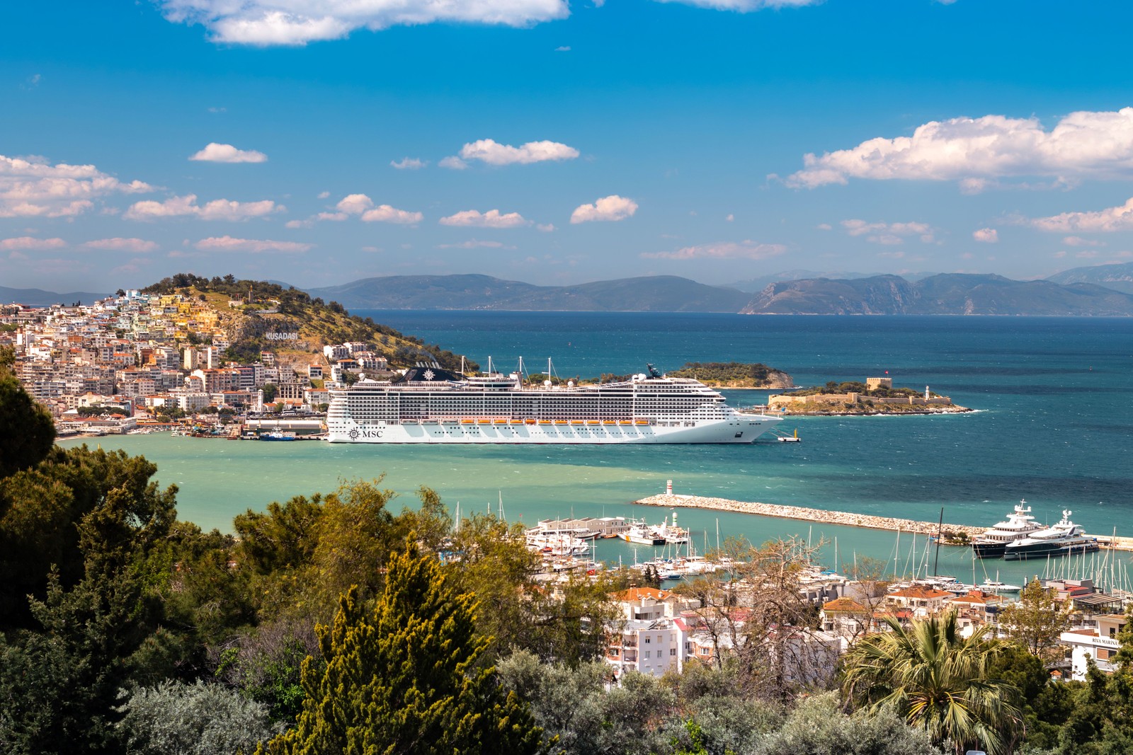 Kusadasi coastline and cruise ship overlooking the Aegean Sea